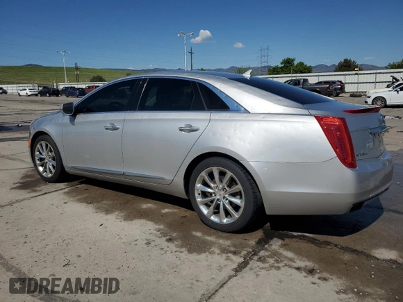 2013 Cadillac XTS Luxury with VIN 2G61R5S32D9131914, listed as a Copart auction lot 56569505 with 123,427 mi miles and Salvage title. Bid and sale history available at DreamBid. Image 2.