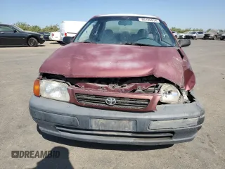 1996 Toyota Tercel DX z VIN JT2AC52L8T0124403, wystawiony jako Copart lot #66195834 z przebiegiem 137 467 mil mil oraz Szkody całkowita. Historia ofert i sprzedaży dostępna na DreamBid. Obrazek 5.