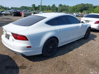 2016 Audi A7 3.0 Premium Plus with VIN WAUWGAFC4GN017486, listed as a IAAI auction lot 40057097 with 85,937 mi miles. Bid and sale history available at carsss.com. Image 4.