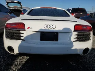 2014 Audi R8 V8 z VIN WUADUAFG5EN000704, wystawiony jako Copart lot #73885864 z przebiegiem Nie podano mil oraz Szkoda całkowita • Salvage title. Historia ofert i sprzedaży dostępna na DreamBid. Obrazek 6.