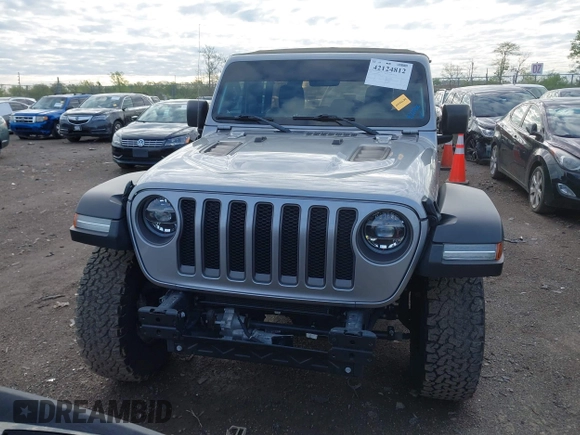 2021 Jeep Wrangler Unlimited Rubicon with VIN 1C4HJXFNXMW560512, listed as a IAAI auction lot 42124812 with 18,034 mi miles and . Bid and sale history available at DreamBid. Image 13.