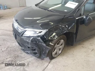 2018 Honda Odyssey EX-L with VIN 5FNRL6H78JB011284, listed as a IAAI auction lot 42000640 with 154,252 mi miles and . Bid and sale history available at DreamBid. Image 6.
