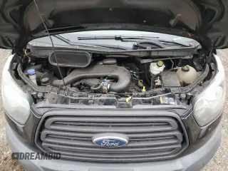 2016 Ford Transit Cargo z VIN 1FTYE1YM4GKA61271, wystawiony jako Copart lot #87135384 z przebiegiem 177 741 mil mil oraz Szkoda całkowita • Salvage title. Historia ofert i sprzedaży dostępna na DreamBid. Obrazek 12.