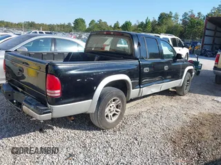 2003 Dodge Dakota SLT with VIN 1D7HL48X93S151422, listed as a IAAI auction lot 40661577 with 238,586 mi miles. Bid and sale history available at carsss.com. Image 4.