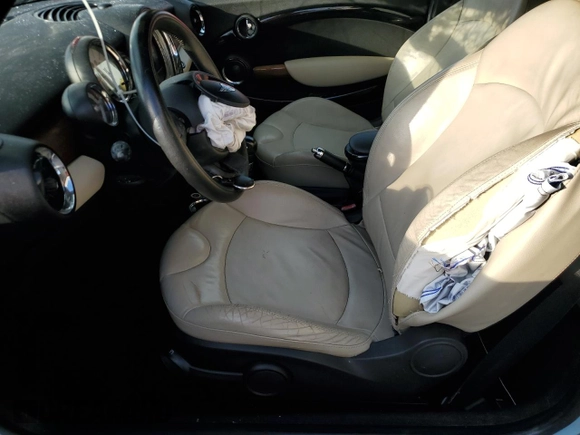2012 MINI Convertible z VIN WMWZN3C59CT135351, wystawiony jako Copart lot #86711044 z przebiegiem 93 515 mil mil oraz Nie do naprawy • Non repairable. Historia ofert i sprzedaży dostępna na DreamBid. Obrazek 7.