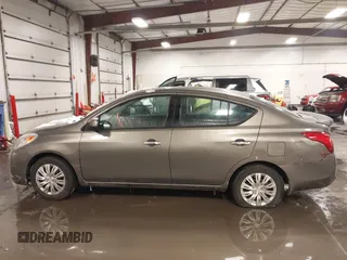 2014 Nissan Versa SV with VIN 3N1CN7AP2EK455471, listed as a IAAI auction lot 41585696 with 167,366 mi miles. Bid and sale history available at carsss.com. Image 14.