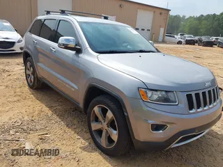 2014 Jeep Grand Cherokee Limited with VIN 1C4RJFBG9EC210507, listed as a IAAI auction lot 42428788 with 141,147 mi miles and . Bid and sale history available at DreamBid. Image 1.