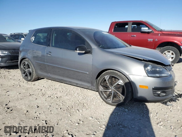 2009 Volkswagen Rabbit S with VIN WVWBB71K29W049688, listed as a Copart auction lot 41865325 with 51,155 mi miles and Salvage title. Bid and sale history available at DreamBid. Image 4.