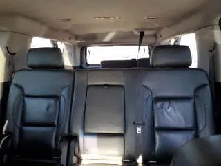 2015 Chevrolet Suburban LT with VIN 1GNSKJKC2FR274506, listed as a Copart auction lot 87881695 with 196,506 mi miles and Salvage Title. Bid and sale history available at DreamBid. Image 10.