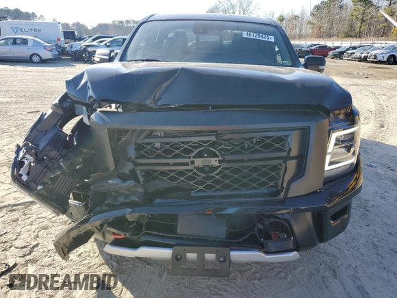 2024 Nissan Titan Pro-4X with VIN 1N6AA1ED6RN111104, listed as a Copart auction lot 46129425 with 4,903 mi miles and Salvage title. Bid and sale history available at DreamBid. Image 5.