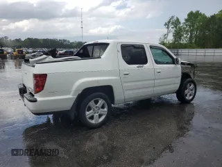 2010 Honda Ridgeline RTL z VIN 5FPYK1F53AB006195, wystawiony jako Copart lot #52528435 z przebiegiem 205 522 mil mil oraz Szkoda całkowita • Salvage title. Historia ofert i sprzedaży dostępna na DreamBid. Obrazek 3.