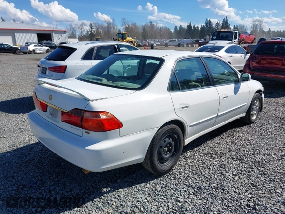 2000 Honda Accord EX with VIN 1HGCG1656YA060793, listed as a IAAI auction lot 41884449 with 232,519 mi miles and . Bid and sale history available at DreamBid. Image 4.