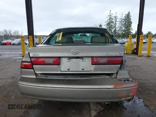 1998 Toyota Camry LE z VIN JT2BF28K1W0109514, wystawiony jako IAAI lot #41610102 z przebiegiem 161 266 mil mil oraz . Historia ofert i sprzedaży dostępna na DreamBid. Obrazek 16.