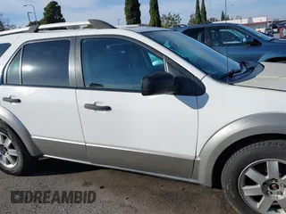 2006 Ford Freestyle SE with VIN 1FMZK04116GA05465, listed as a IAAI auction lot 41610170 with 94,097 mi miles. Bid and sale history available at carsss.com. Image 13.