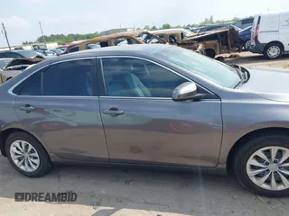 2016 Toyota Camry XLE with VIN 4T4BF1FKXGR521530, listed as a IAAI auction lot 41900074 with 151,251 mi miles and . Bid and sale history available at DreamBid. Image 14.