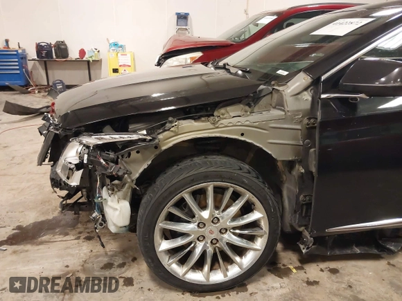 2014 Cadillac XTS Platinum with VIN 2G61W5S88E9186969, listed as a IAAI auction lot 41422872 with 184,998 mi miles and . Bid and sale history available at DreamBid. Image 17.