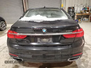 2017 BMW 7 Series 740i with VIN WBA7E2C3XHG741046, listed as a Copart auction lot 45382705 with 99,065 mi miles and Salvage Title. Bid and sale history available at carsss.com. Image 6.