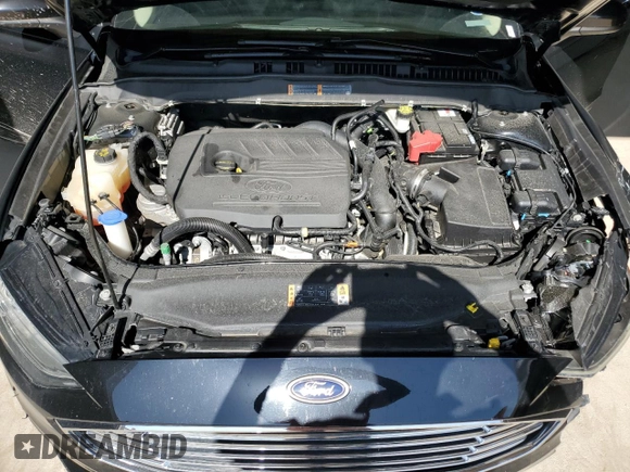 2018 Ford Fusion SE z VIN 3FA6P0HDXJR130677, wystawiony jako Copart lot #51737345 z przebiegiem 129 918 mil mil oraz Szkoda całkowita • Salvage title. Historia ofert i sprzedaży dostępna na DreamBid. Obrazek 13.