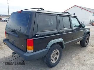 1998 Jeep Cherokee Sport with VIN 1J4FJ68S3WL285200, listed as a IAAI auction lot 41834529 with 335,881 mi miles and . Bid and sale history available at DreamBid. Image 4.
