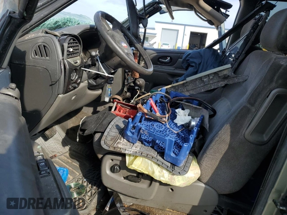 2004 GMC Envoy XL SLE with VIN 1GKET16S346115131, listed as a Copart auction lot 82677024 with 290,656 mi miles and Salvage Title. Bid and sale history available at carsss.com. Image 7.