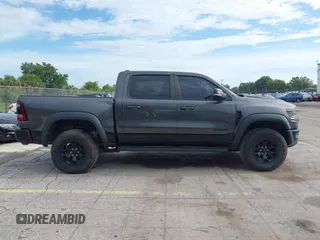 2021 Ram 1500 TRX with VIN 1C6SRFU98MN820577, listed as a IAAI auction lot 42652005 with 43,429 mi miles and . Bid and sale history available at DreamBid. Image 13.