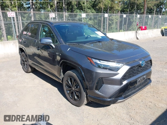 2022 Toyota RAV4 Hybrid SE z VIN 4T3T6RFV5NU101105, wystawiony jako IAAI lot #42666372 z przebiegiem 7 644 mil mil oraz . Historia ofert i sprzedaży dostępna na DreamBid. Obrazek 1.