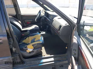 1998 Jeep Grand Cherokee Laredo с VIN 1J4GZ58YXWC135418, выставлен на аукционе IAAI как лот 42305887 с пробегом 260 061 миль миль и . История ставок и продаж доступна на DreamBid. Изображение 5.