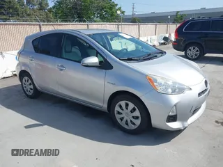 2012 Toyota Prius One with VIN JTDKDTB3XC1001211, listed as a IAAI auction lot 42294372 with 158,415 mi miles and . Bid and sale history available at DreamBid. Image 1.