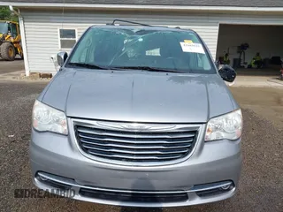 2014 Chrysler Town & Country Touring L z VIN 2C4RC1CG7ER201727, wystawiony jako IAAI lot #42163525 z przebiegiem 160 304 mil mil oraz . Historia ofert i sprzedaży dostępna na DreamBid. Obrazek 13.