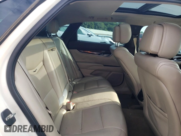 2013 Cadillac XTS Luxury with VIN 2G61P5S37D9186395, listed as a Copart auction lot 56859015 with 132,458 mi miles and Salvage title. Bid and sale history available at DreamBid. Image 10.
