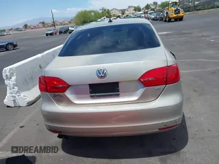 2014 Volkswagen Jetta SE with VIN 3VWD17AJ9EM271431, listed as a IAAI auction lot 42419304 with 143,599 mi miles and . Bid and sale history available at DreamBid. Image 13.