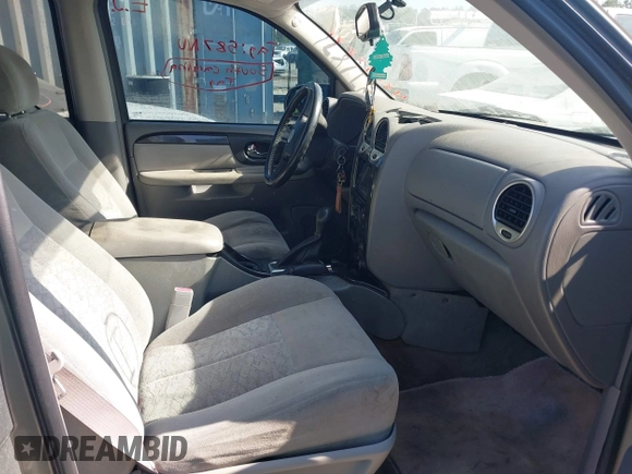 2005 GMC Envoy SLT with VIN 1GKDS13SX52175970, listed as a IAAI auction lot 42047871 with 205,432 mi miles. Bid and sale history available at carsss.com. Image 5.