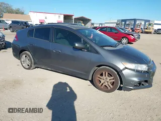 2012 Honda Insight LX с VIN JHMZE2H51CS003694, выставлен на аукционе IAAI как лот 41781384 с пробегом 154 685 миль миль и . История ставок и продаж доступна на DreamBid. Изображение 1.