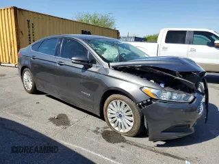 2016 Ford Fusion SE Hybrid with VIN 3FA6P0LU3GR307666, listed as a Copart auction lot 57444365 with 127,786 mi miles and Salvage title. Bid and sale history available at DreamBid. Image 4.