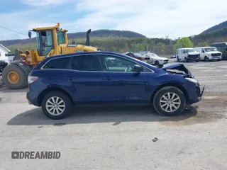 2011 Mazda CX-7 i Sport with VIN JM3ER2BM2B0402765, listed as a IAAI auction lot 42095402 with 206,502 mi miles and . Bid and sale history available at carsss.com. Image 13.