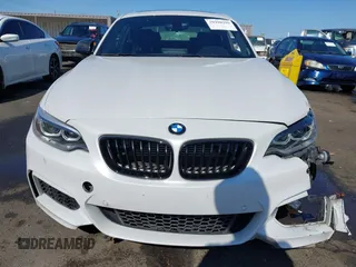 2016 BMW 2 Series M235i with VIN WBA1J7C5XGV359562, listed as a IAAI auction lot 39990299 with 54,022 mi miles. Bid and sale history available at carsss.com. Image 12.