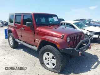 2007 Jeep Wrangler Unlimited Sahara z VIN 1J4GA59187L116585, wystawiony jako IAAI lot #41996297 z przebiegiem 151 961 mil mil oraz . Historia ofert i sprzedaży dostępna na DreamBid. Obrazek 1.