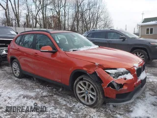 2015 BMW X1 xDrive28i with VIN WBAVL1C51FVY33650, listed as a IAAI auction lot 41400985 with 132,484 mi miles. Bid and sale history available at carsss.com. Image 1.