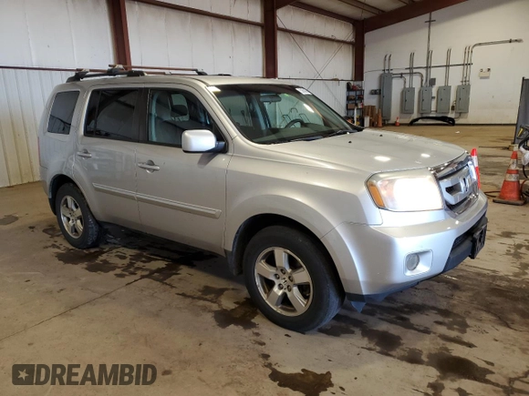 2011 Honda Pilot EX with VIN 5FNYF4H41BB082857, listed as a Copart auction lot 52669985 with 288,165 mi miles and Salvage Title. Bid and sale history available at DreamBid. Image 4.