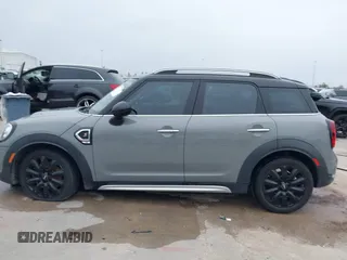 2018 MINI Countryman Cooper S z VIN WMZYT3C35J3E93291, wystawiony jako IAAI lot #41281432 z przebiegiem 58 774 mil mil oraz . Historia ofert i sprzedaży dostępna na DreamBid. Obrazek 14.