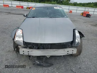 2005 Nissan 350Z Touring z VIN JN1AZ34E05M654954, wystawiony jako Copart lot #57591085 z przebiegiem Nie podano mil oraz Tytuł czysty. Historia ofert i sprzedaży dostępna na DreamBid. Obrazek 5.