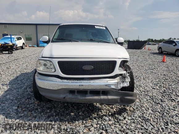 2002 Ford F-150 XL with VIN 1FTRX17272NB01218, listed as a Copart auction lot 61336795 with 201,972 mi miles and Salvage title. Bid and sale history available at DreamBid. Image 5.