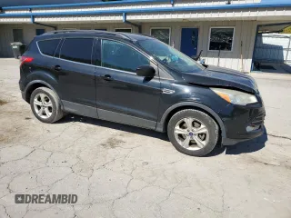 2014 Ford Escape SE with VIN 1FMCU9GX1EUB06543, listed as a Copart auction lot 75326984 with 119,881 mi miles and Salvage title. Bid and sale history available at DreamBid. Image 4.