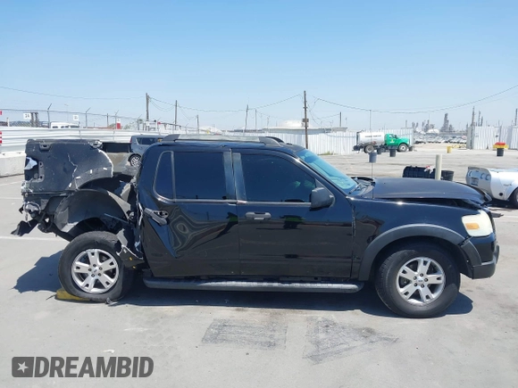 2007 Ford Explorer Sport Trac XLT z VIN 1FMEU31K17UA01300, wystawiony jako IAAI lot #42321378 z przebiegiem 221 813 mil mil oraz . Historia ofert i sprzedaży dostępna na DreamBid. Obrazek 14.