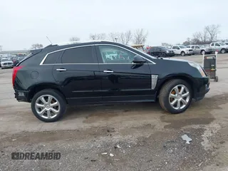 2015 Cadillac SRX Premium Collection with VIN 3GYFNGE37FS556860, listed as a IAAI auction lot 41854634 with 170,808 mi miles and . Bid and sale history available at DreamBid. Image 13.