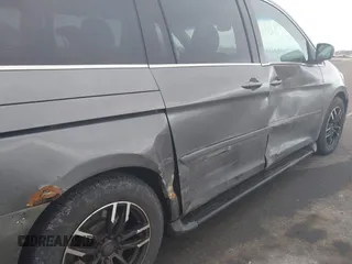 2008 Honda Odyssey Touring with VIN 5FNRL38888B018625, listed as a IAAI auction lot 41383235 with 215,255 mi miles. Bid and sale history available at carsss.com. Image 13.