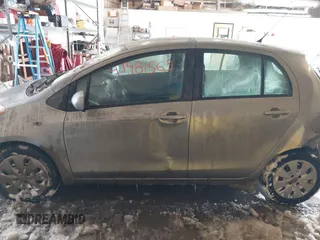 2010 Toyota Yaris with VIN JTDKT4K3XA5290654, listed as a IAAI auction lot 41481563 with 115,012 mi miles. Bid and sale history available at carsss.com. Image 14.