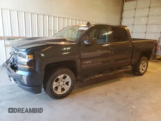 2018 Chevrolet Silverado 1500 LT with VIN 3GCUKRECXJG283331, listed as a Copart auction lot 52102345 with 69,603 mi miles and Salvage Title. Bid and sale history available at DreamBid. Image 1.