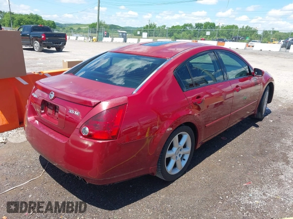 2004 Nissan Maxima SL with VIN 1N4BA41E04C838112, listed as a IAAI auction lot 42164374 with 185,306 mi miles and . Bid and sale history available at DreamBid. Image 4.
