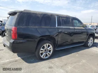 2017 Chevrolet Suburban Premier with VIN 1GNSCJKC0HR140111, listed as a Copart auction lot 74387664 with 104,094 mi miles and Salvage Title. Bid and sale history available at carsss.com. Image 3.